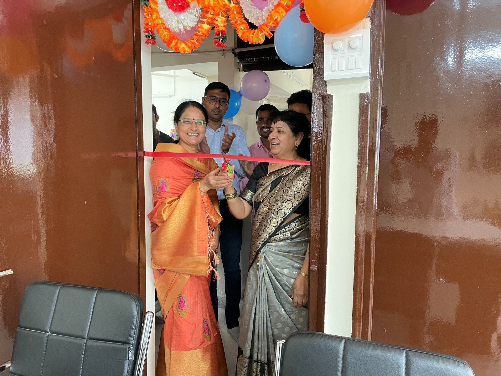 Ribbon cutting at the Pune main office